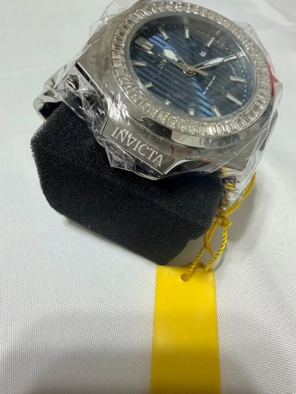 Invicta Men’s Akula 58mm silver watch with silver bracelet.